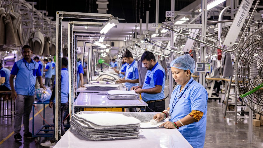 Pirelli Georgia Tire Plant Expansion: What This Means for Shoppers and the Industry 2 automotive production workers assembly line