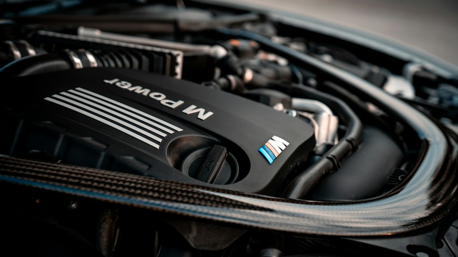 Genesis GV80 Undercuts BMW X5 and Mercedes GLE by Thousands: What Buyers Should Know 2 BMW performance engine close-up