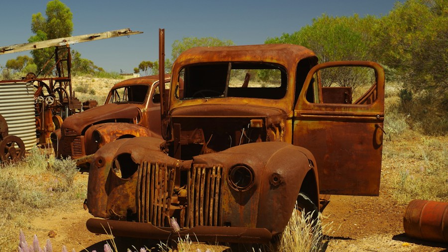 Massive Vintage Truck Auction Exposes Rust and Corrosion Risks for Restoration Buyers 1 classic cars weathered rust outdoors