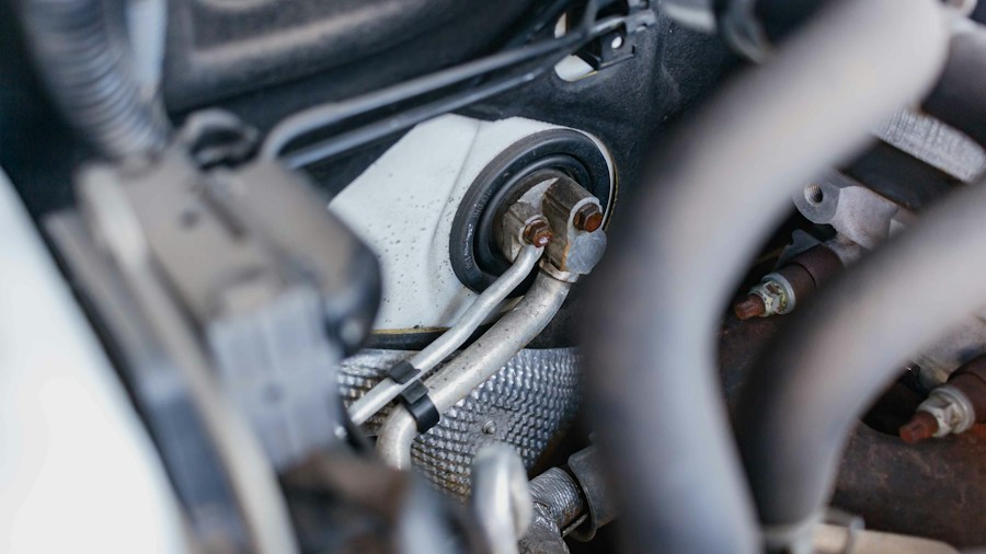 Transmission Fluid and Torque Converter Shudder: What Buyers Should Know 1 close up transmission fluid check