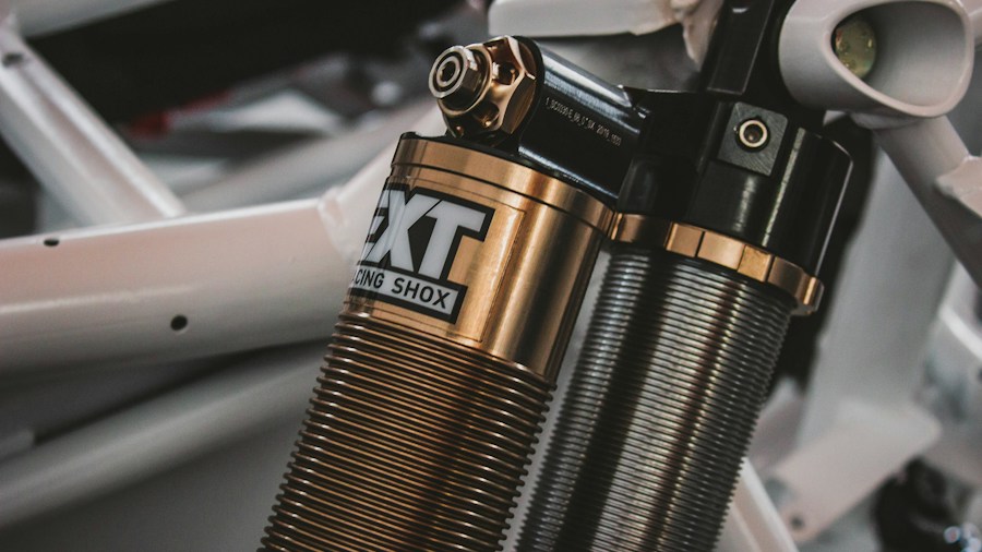 electric dirt bike suspension and frame details