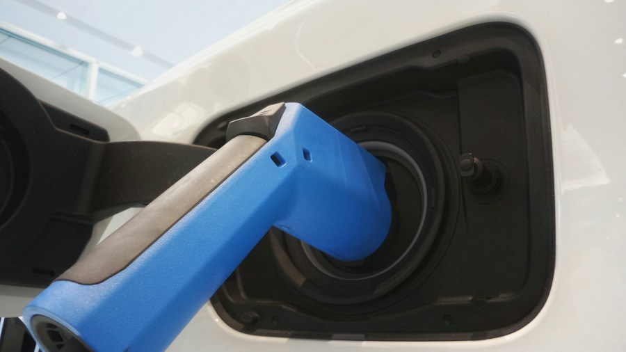 F-150 Excluded from 2027 Truck of the Year Competition: What Buyers Need to Know 1 electric pickup truck charging