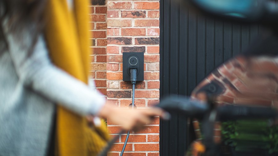 Honda QC3 Electric Scooter Launches in India: What US Buyers Need to Know 1 electric scooter charging at home