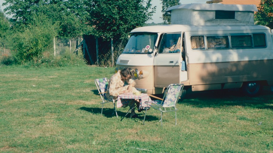 family camping inside RV