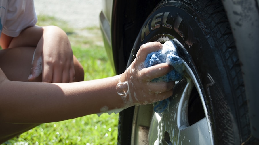 7 Essential Tips for Installing and Maintaining Adhesive Wheel Weights 1 hands cleaning wheel surface with cloth