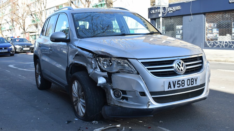 Lifted F-150 Lawsuit Exposes Safety Risk for Other Drivers: What Buyers Should Know 2 head-on vehicle collision damage