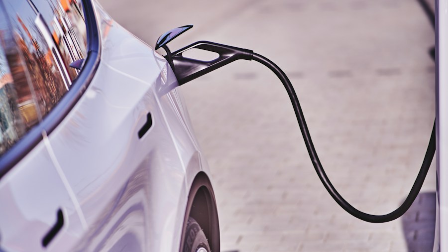 U.S. Auto Sales Expected to Stay Below Pre-Pandemic Levels: What Tire Shoppers Should Know 1 hybrid electric vehicle driving