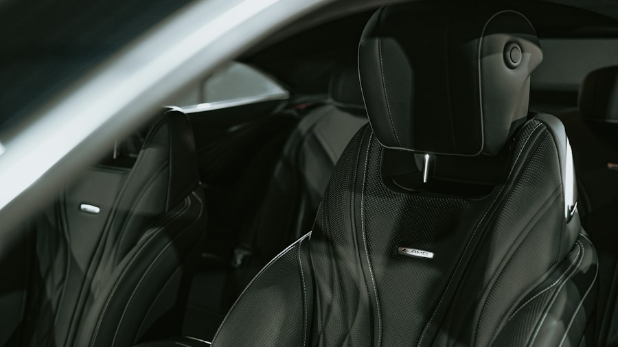 Genesis GV80 Undercuts BMW X5 and Mercedes GLE by Thousands: What Buyers Should Know 1 luxury sedan front seats detail