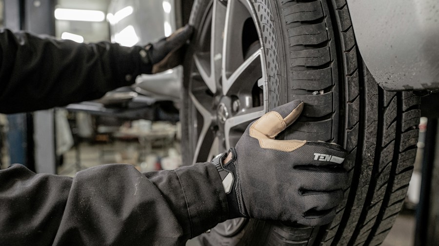 VIP Tires Expands to 78 Locations With M and M Service Station Acquisition What Shoppers Should Know 1 mechanic changing car tire service