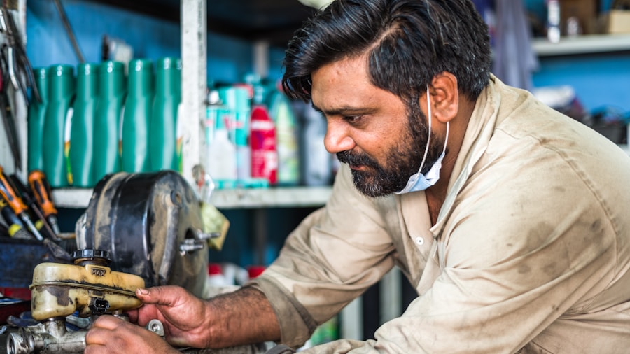 Brake Pedal Problems and Tire Health: What Buyers Should Know About Vehicle Maintenance 1 mechanic inspecting brake caliper