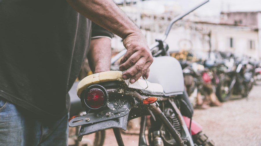 Yamaha XJ650 Seca Turbo Restored to Life: What Collectors and Buyers Should Know 1 mechanic servicing brake system vintage motorcycle