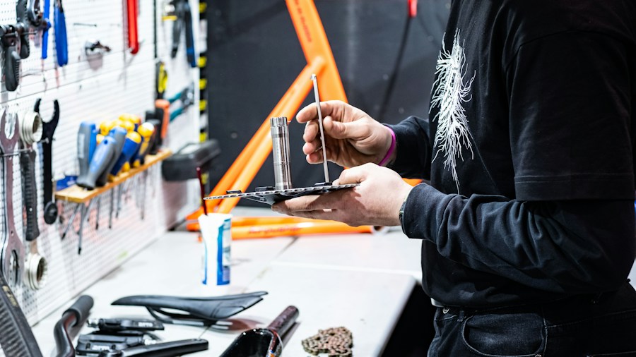 TOPDON Launches ONE Moto Diagnostic Tool for Motorcycles: What Riders and Technicians Should Know 1 mechanic using tablet diagnostic tool