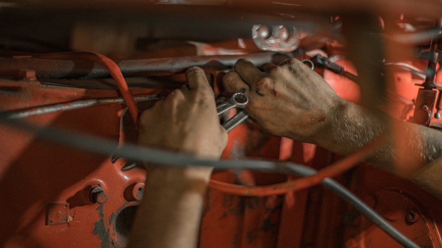 Wagner Expands Brake Caliper Selection with 547 New SKUs: What Shoppers Need to Know 1 mechanic working on brakes