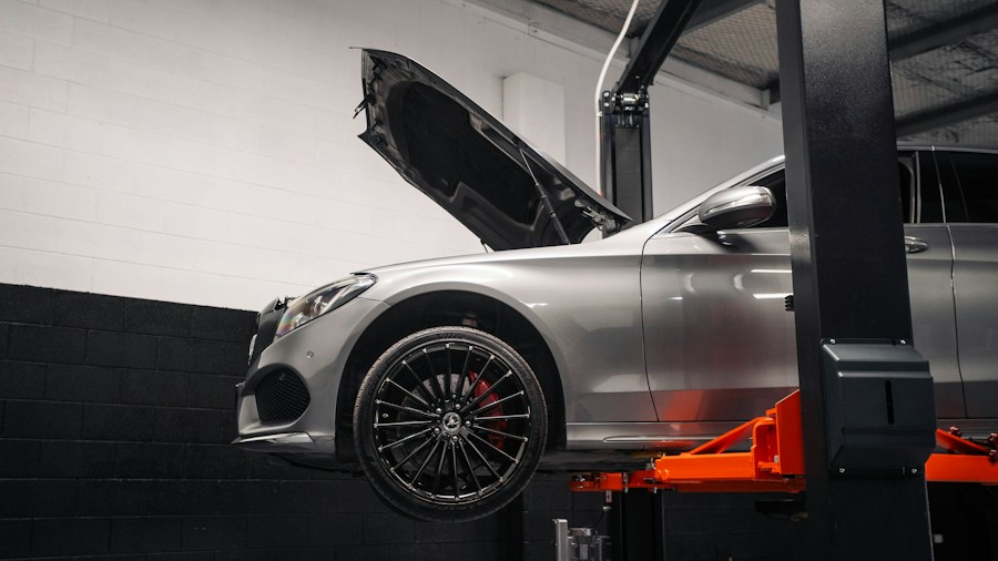 Momentum USA Expands Brake Friction Catalog: What Shoppers and Fleet Operators Should Know 1 modern electric vehicle on lift