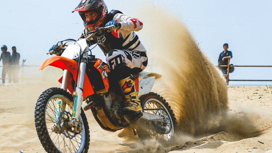 MotoGP Star Pedro Acosta Faces Off Against F1's Oscar Piastri in High Performance Side by Side Challenge 1 motocross track racing action