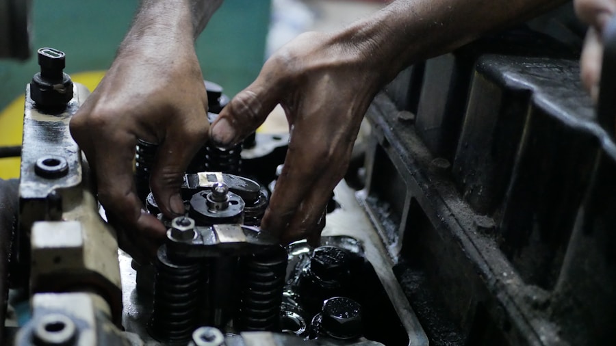 motorcycle mechanic rebuilding engine