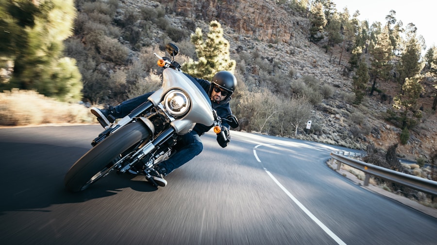 Ducati's New Electric Motorcycle Patent Reveals 18500 RPM Motor: What Buyers Should Know 2 motorcycle rider winding road