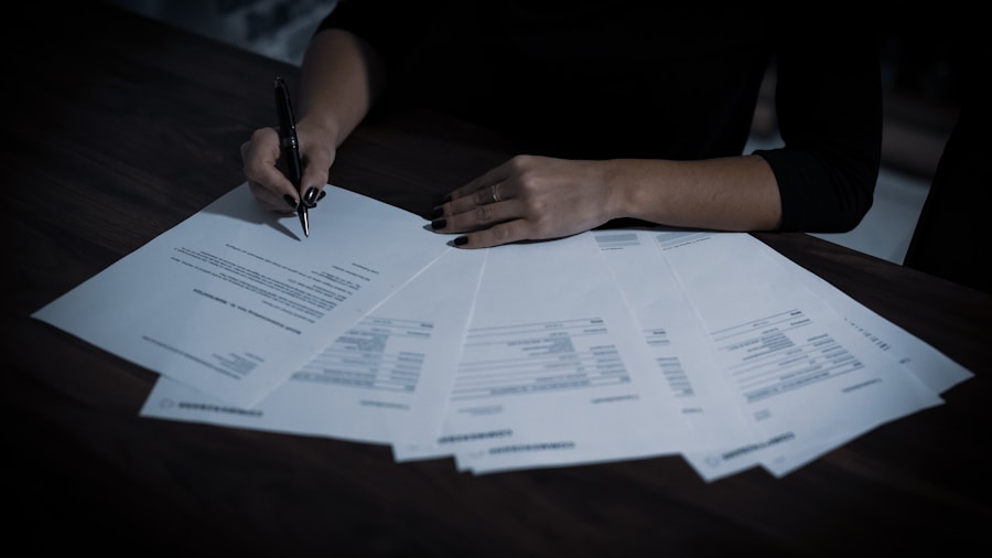 owner reading repair estimate paperwork