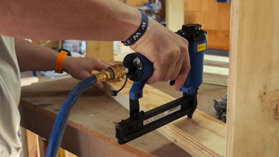 pneumatic nail gun in action