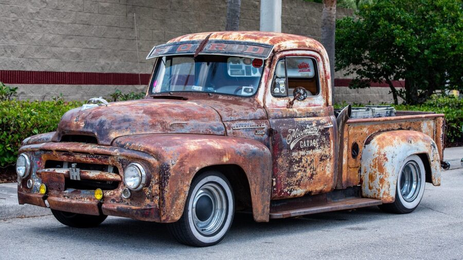 red pickup truck side profile