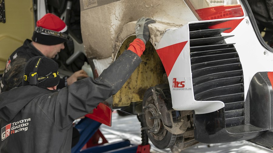RV service technician working on motorhome