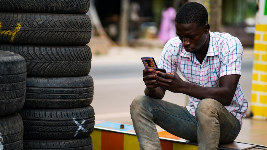 Millions of Recalled Tires Still on the Road: What Shoppers Need to Know 1 technician scanning tire with smartphone