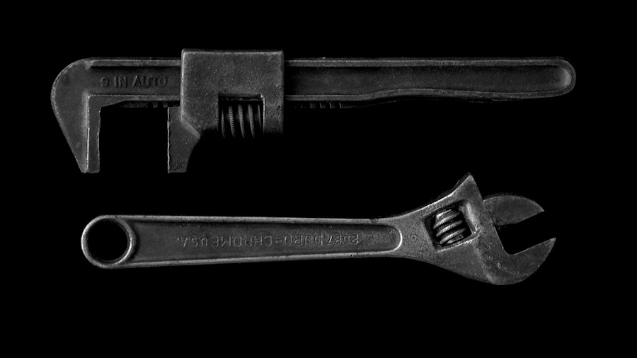 tradesperson adjustable wrench fastening bolts