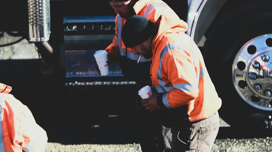 truck owner with mechanic discussing repairs